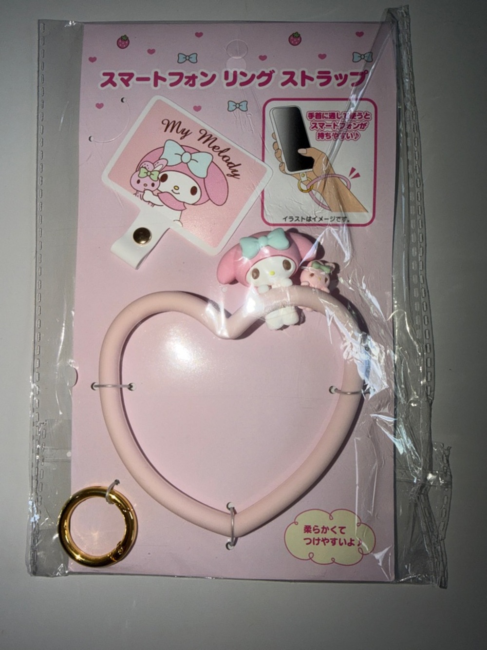 Sanrio My Melody Pink Phone Ring Strap with Blue Bow Accent